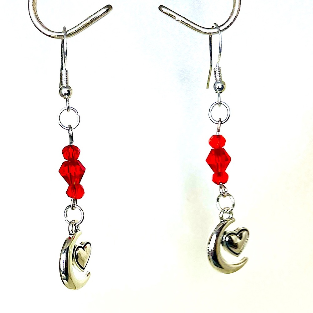 Handmade heart charm earrings.